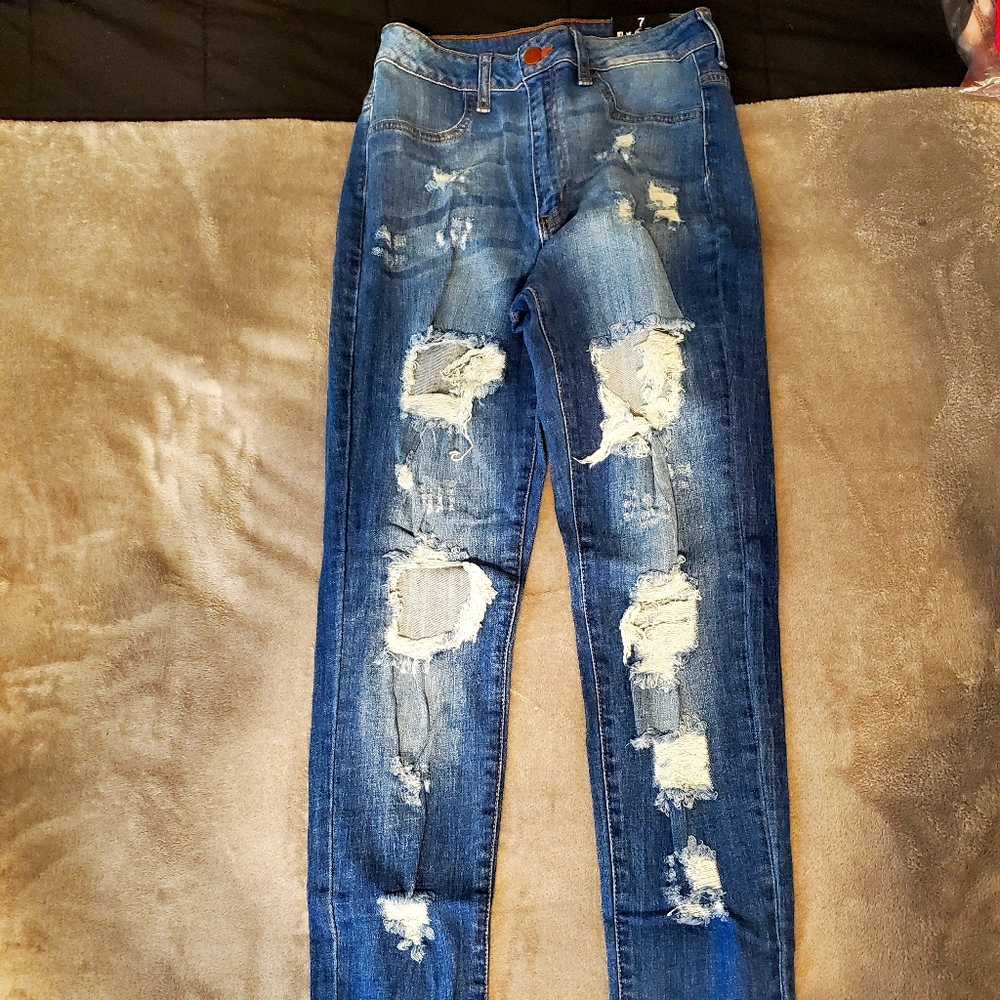 NWT Destroyed dark blue jeans